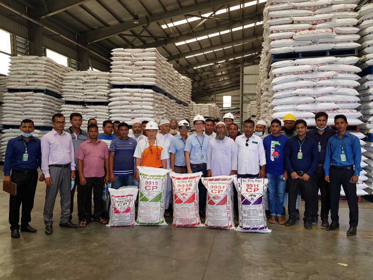 Farmers and agents visited CP Bangladesh’s fish feed mill.